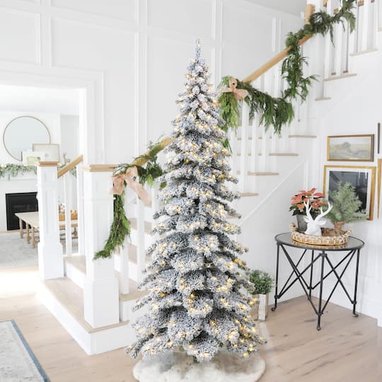 9ft. Pre-Lit Flocked Layered Spruce Artificial Christmas Tree, Warm White LED Lights